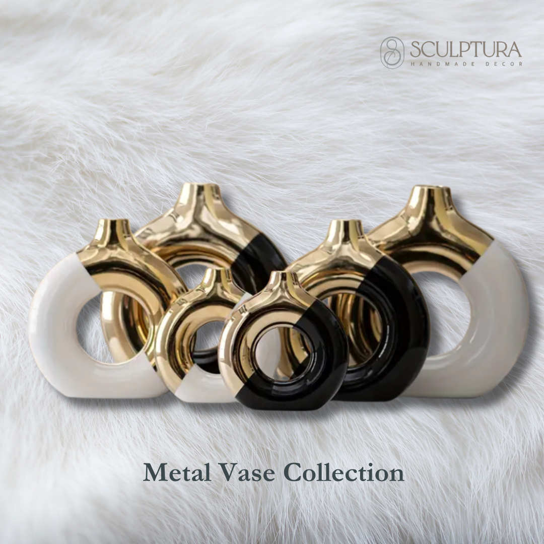 Elegant handcrafted gypsum vases with black, white, and gold metallic finishing, designed for luxury home decor by Sculptura.