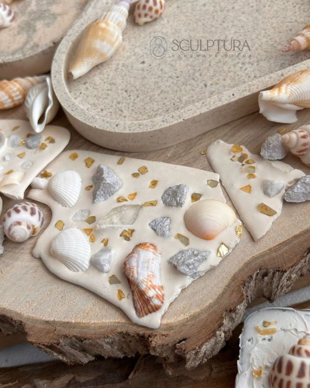 Minimalist gypsum tray featuring organic shells and crushed stones for elegant decor