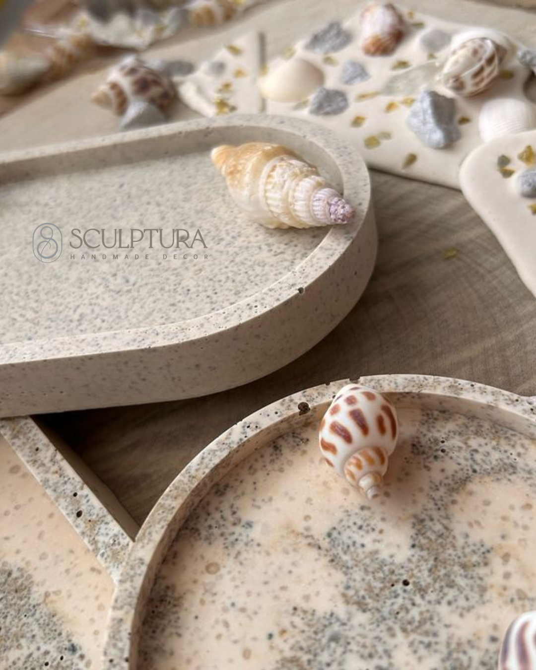 Set of eco-friendly gypsum trays and decorative pieces with sea-inspired textures